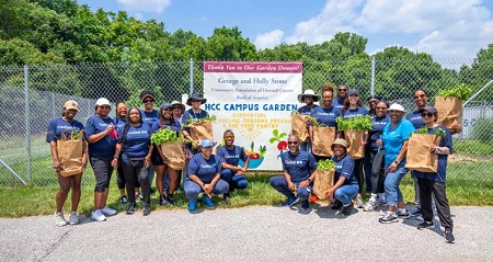 Students in front of sign