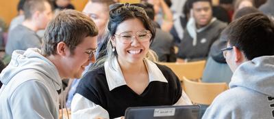 Students gathered at a table