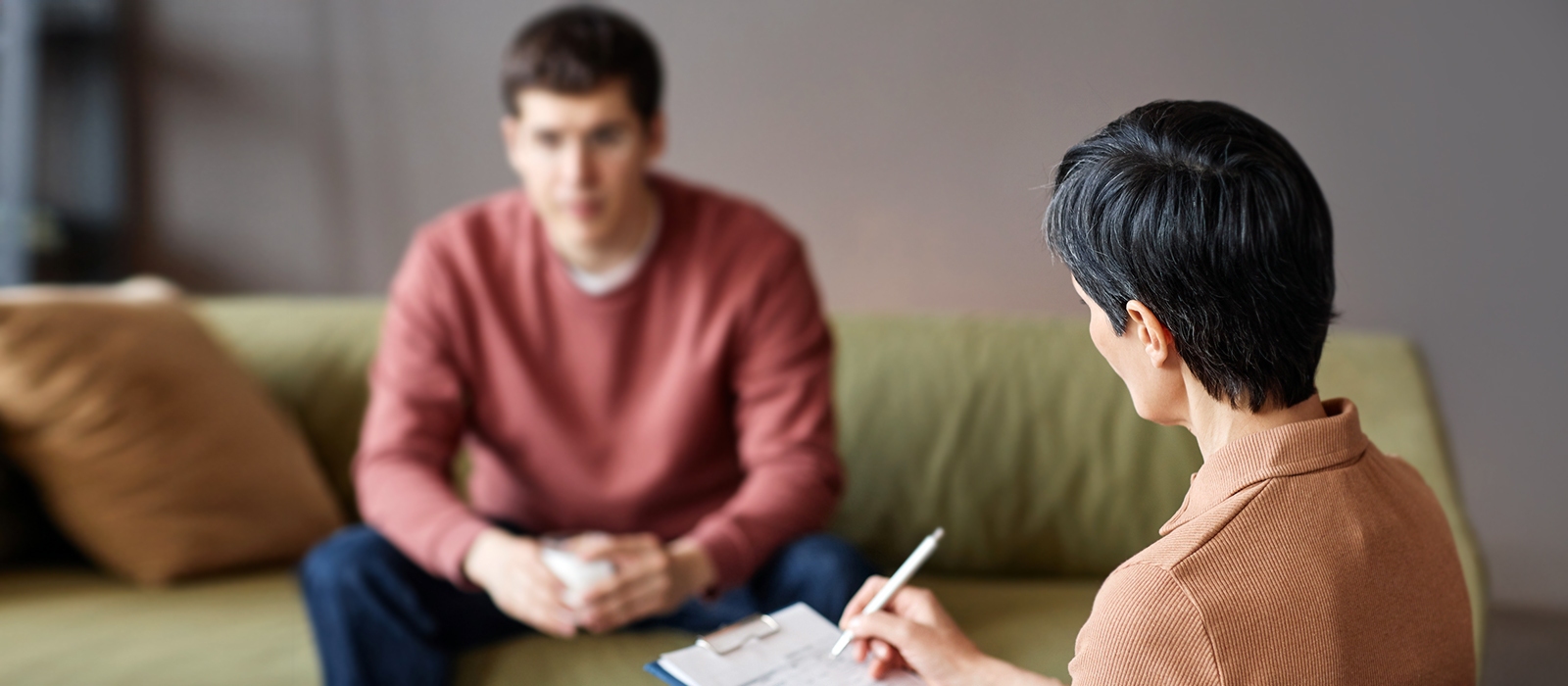 A student and therapist in conversation.